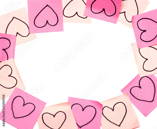 Post-it pink frame with drawn hearts closeup
