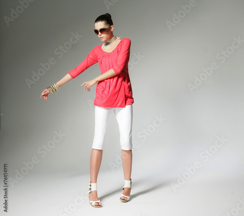 portrait of a styled professional model wearing modern sunglasses 