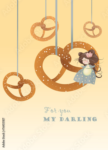 Cute girl sitting on pretzel