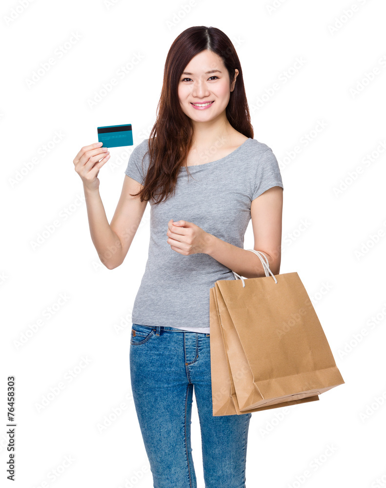 Woman hold with shopping bag and credit card Woman hold with shopping bag and credit card