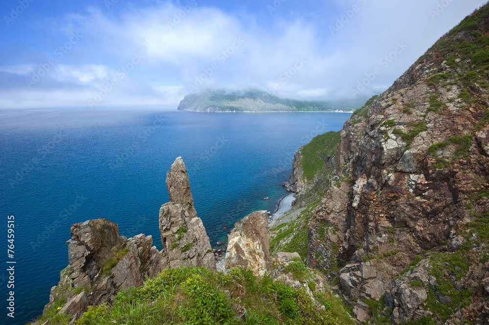 High, steep cliffs of the island Askold. High, steep cliffs of the island Askold.