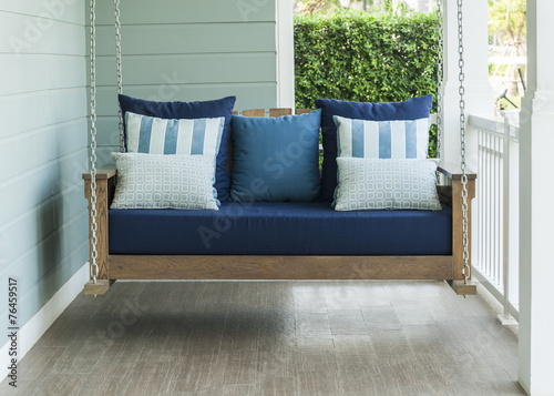 vintage swing and blue pillow