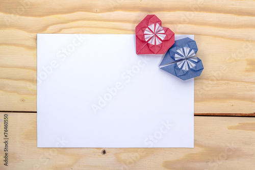 valentines card with origami blue and red hearts