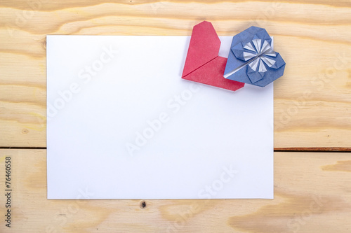 valentines card with origami blue and red hearts