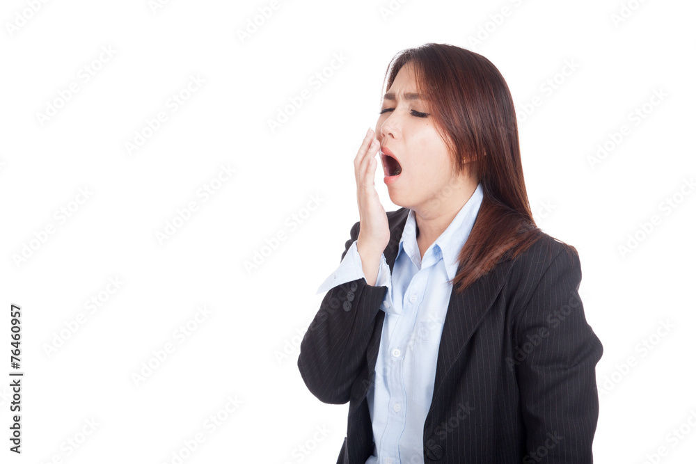 Tired young Asian businesswoman yawn Tired young Asian businesswoman yawn