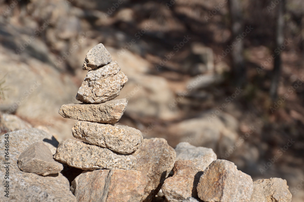 Stone cairn on a blurry background Stone cairn on a blurry background