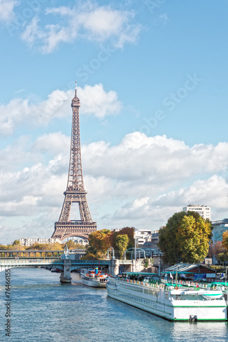 Paris  the Eiffel Tower and the Seine River in the fall on a sun