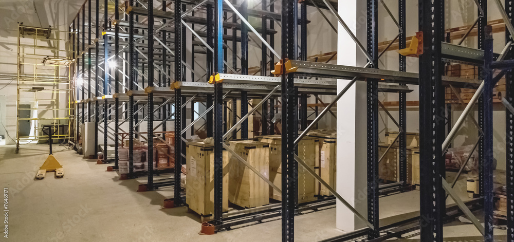 Warehouse interior with empty shelves