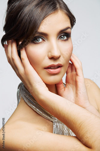 Beauty woman face close up portrait. Female young model. Studio