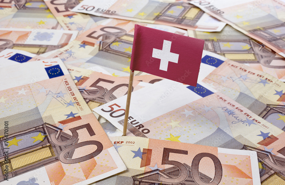 Flag of Switzerland sticking in 50 Euro banknotes.(series) Flag of Switzerland sticking in 50 Euro banknotes.(series)