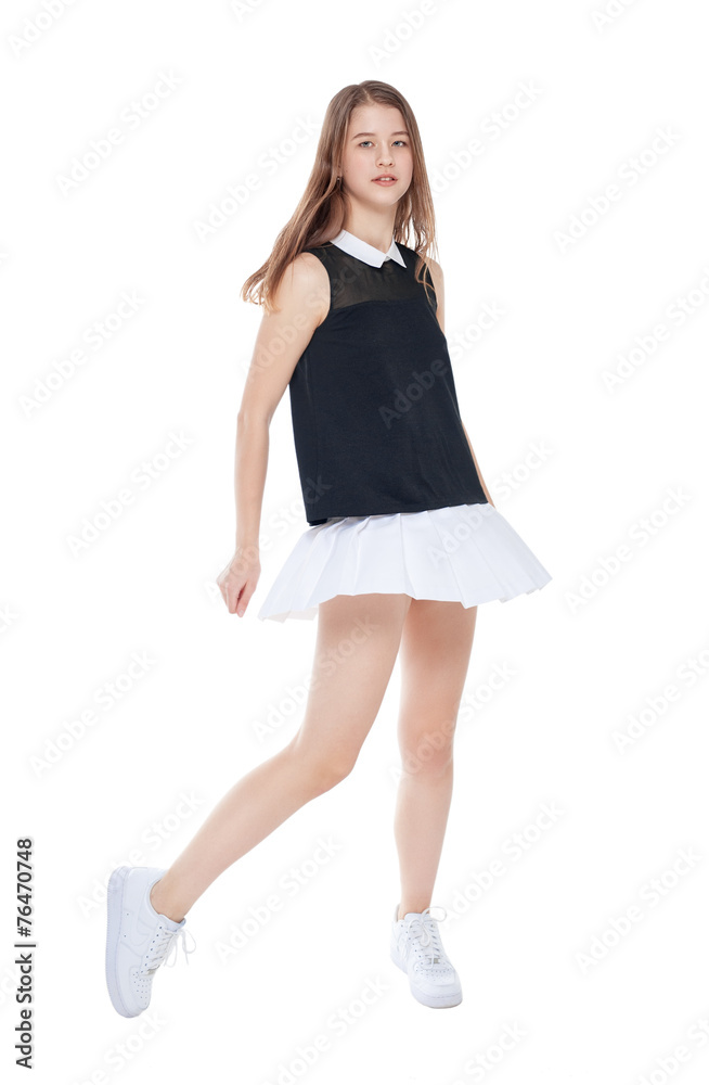 Young fashion girl in white skirt posing isolated Young fashion girl in white skirt posing isolated