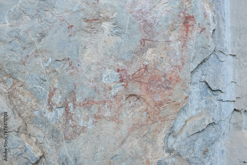 Paint of human hunting on sandstone wall, copy of prehistoric pi