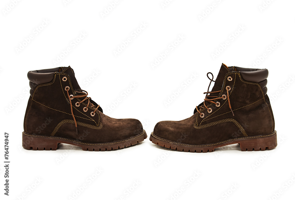 Photo of man's boots. Isolated on white background