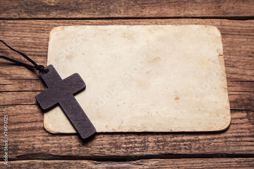 Canvastavla wooden cross on paper background