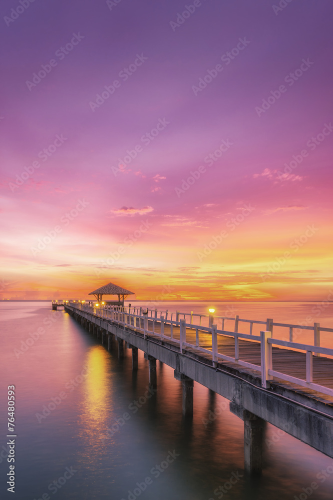 Landscape of Wooded bridge in the port between sunrise