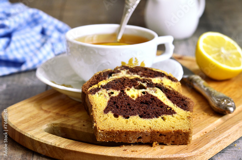 Pumpkin and chocolate cake with cup of tea.