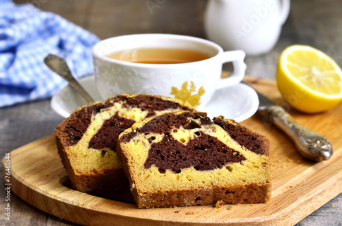 Pumpkin and chocolate cake with cup of tea.
