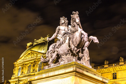 The Louvre at night in Paris