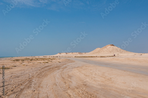 Remote empty sand filled desert in Zekreet- Qatar middle east