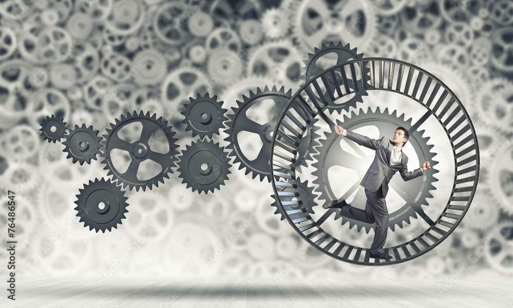 Obraz premium Businessman in wheel