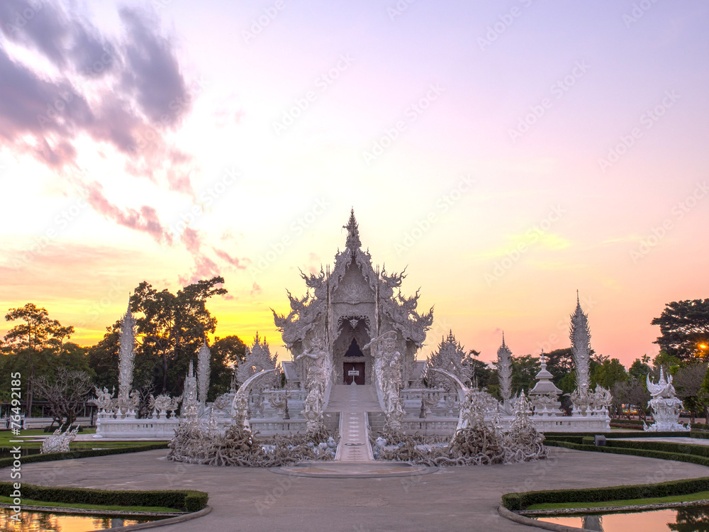 Naklejka premium White temple in evening sky