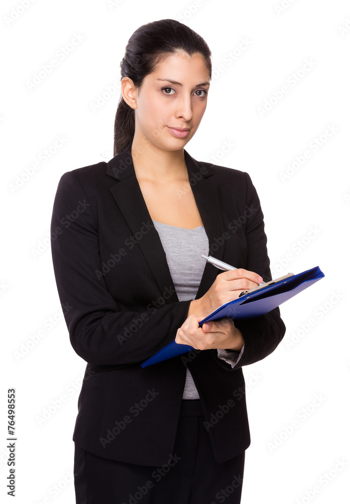 Businesswoman write on clipboard Businesswoman write on clipboard