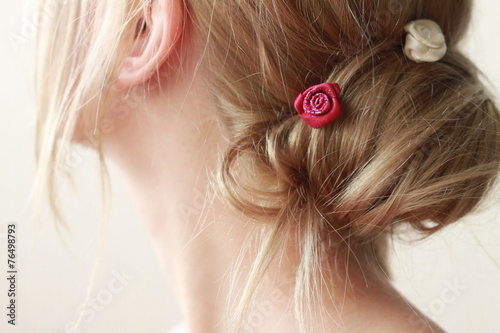 blond woman with hair pin
