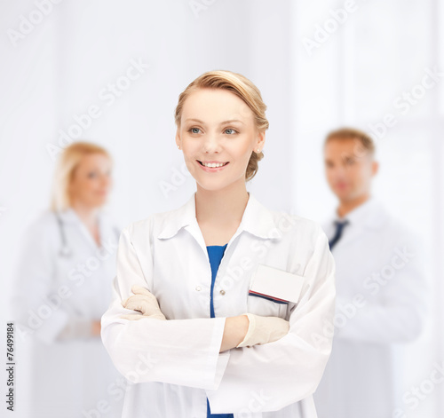 smiling young female doctor in hospital