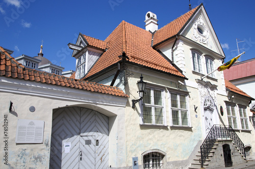 Ancient building under the red tiled roof in Tallinn, Estonia