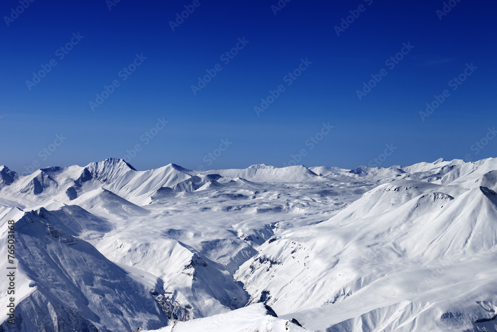 Snow plateau and blue clear sky Snow plateau and blue clear sky
