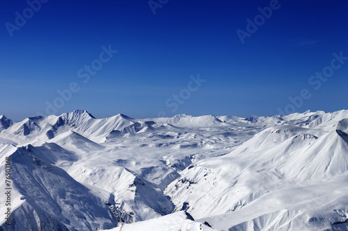 Snow plateau and blue clear sky