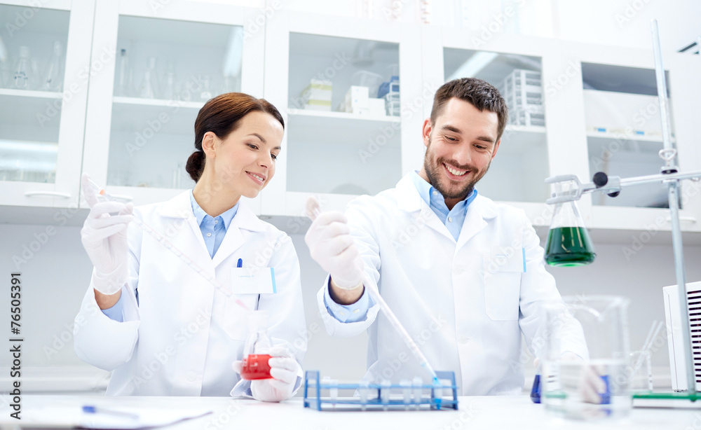 young scientists making test or research in lab young scientists making test or research in lab