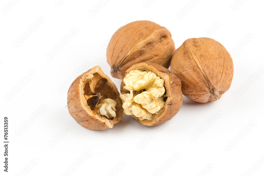 open walnuts closeup on white background open walnuts closeup on white background