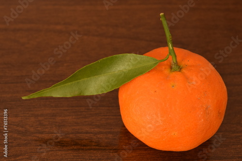 Ripe clementine mandarines with leaves.