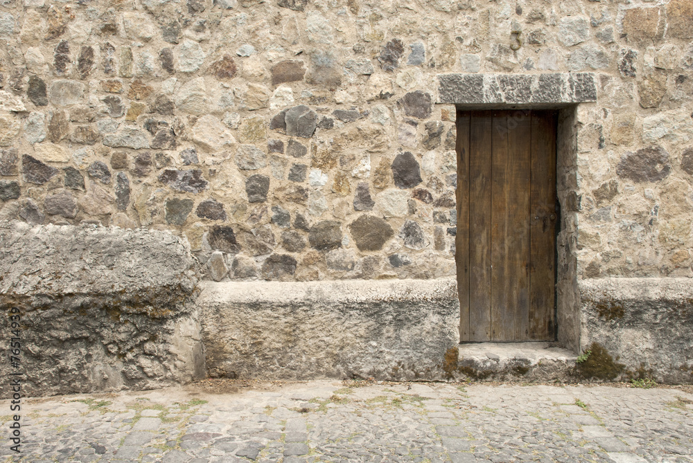 Spanish Colonial Style - Wooden Door And Stone Wall