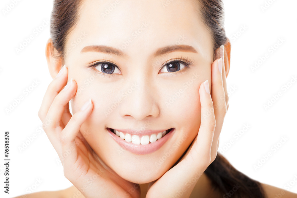 closeup smiling young woman face isolated on white closeup smiling young woman face isolated on white