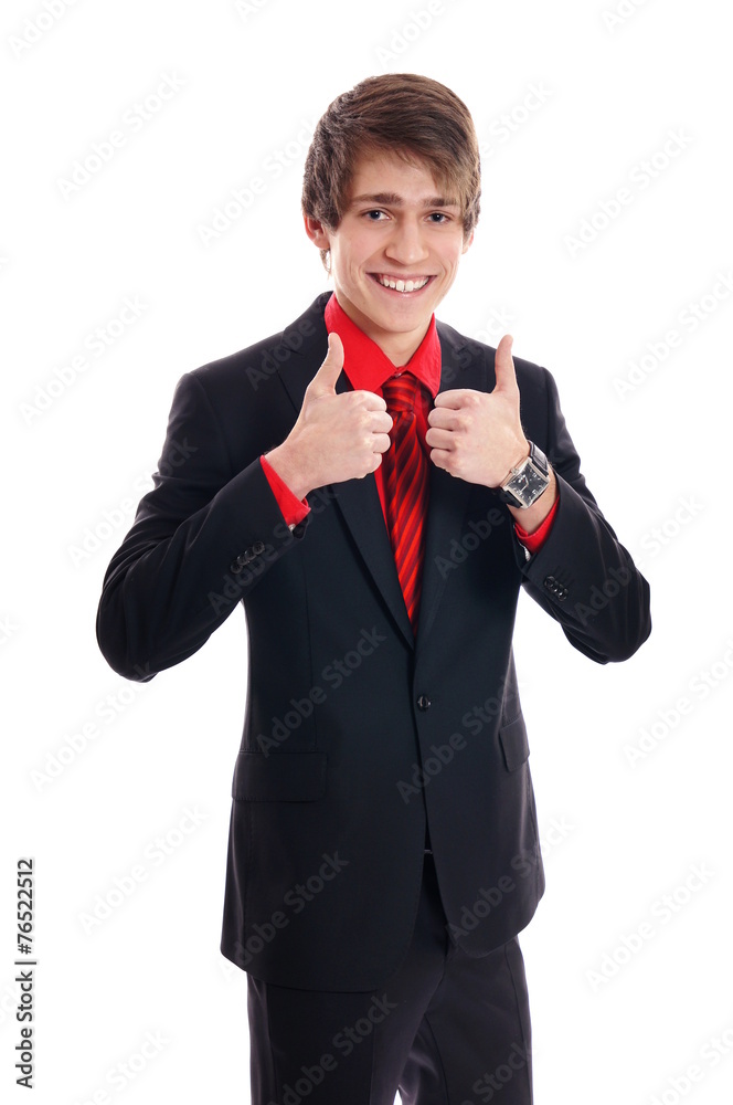 Young businessman in suit showing thumbs up on white background Young businessman in suit showing thumbs up on white background