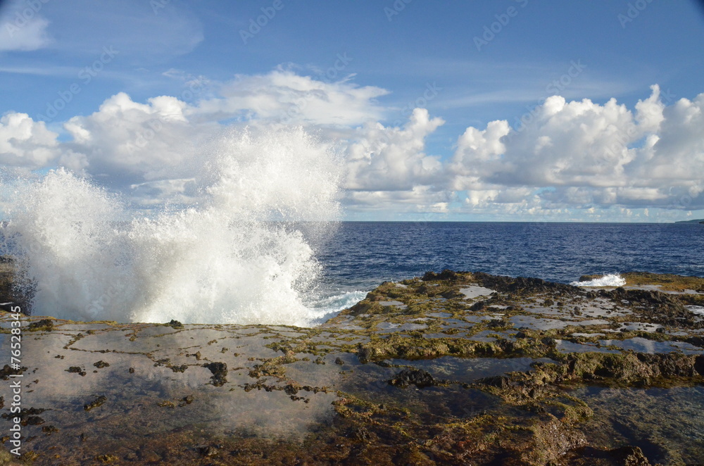 Seaside with breaking wave