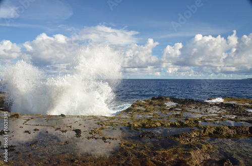Seaside with breaking wave