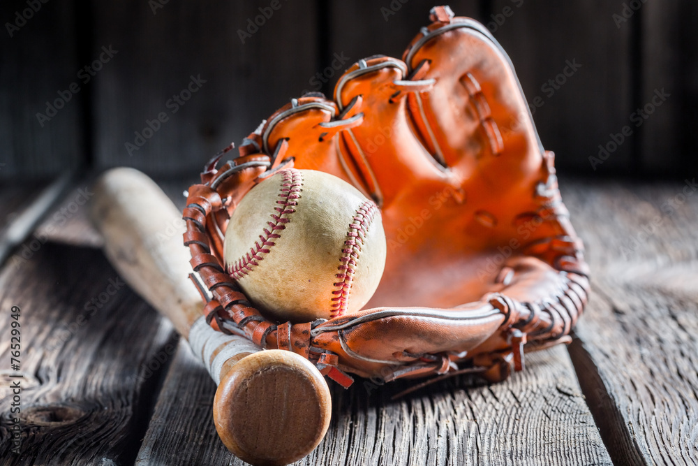 Fototapeta premium Vintage Baseball in a leather glove