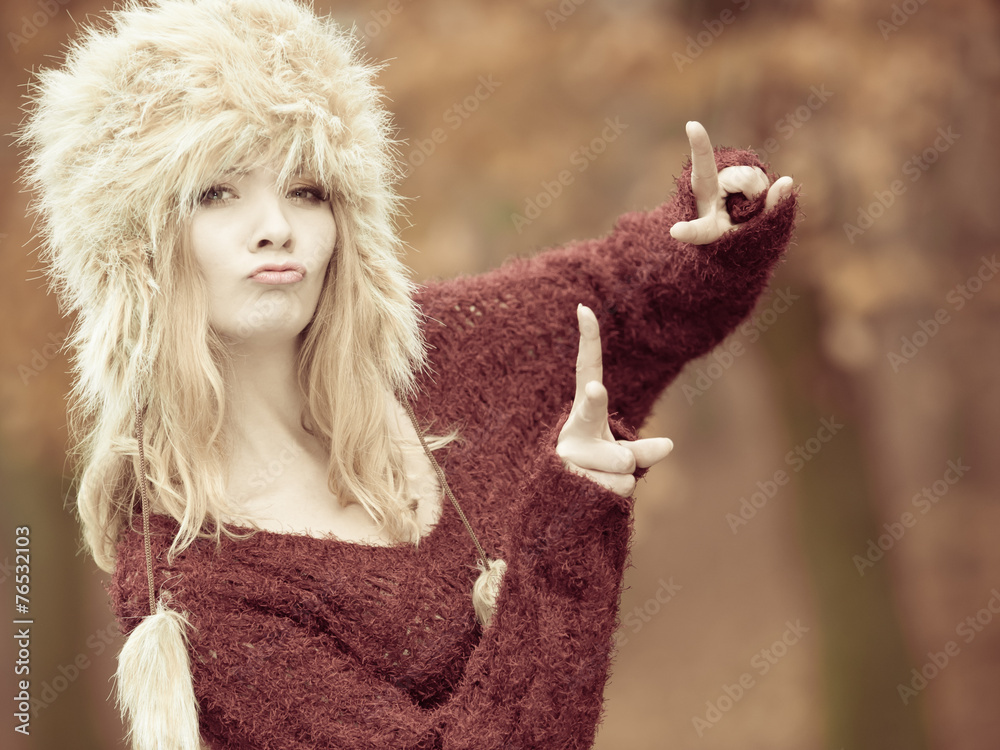 woman in winter clothing fur cap woman in winter clothing fur cap