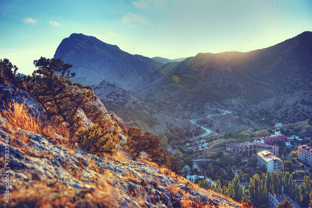 Fototapeta premium The mountains and the village at sunset. Crimea landscape. Natur