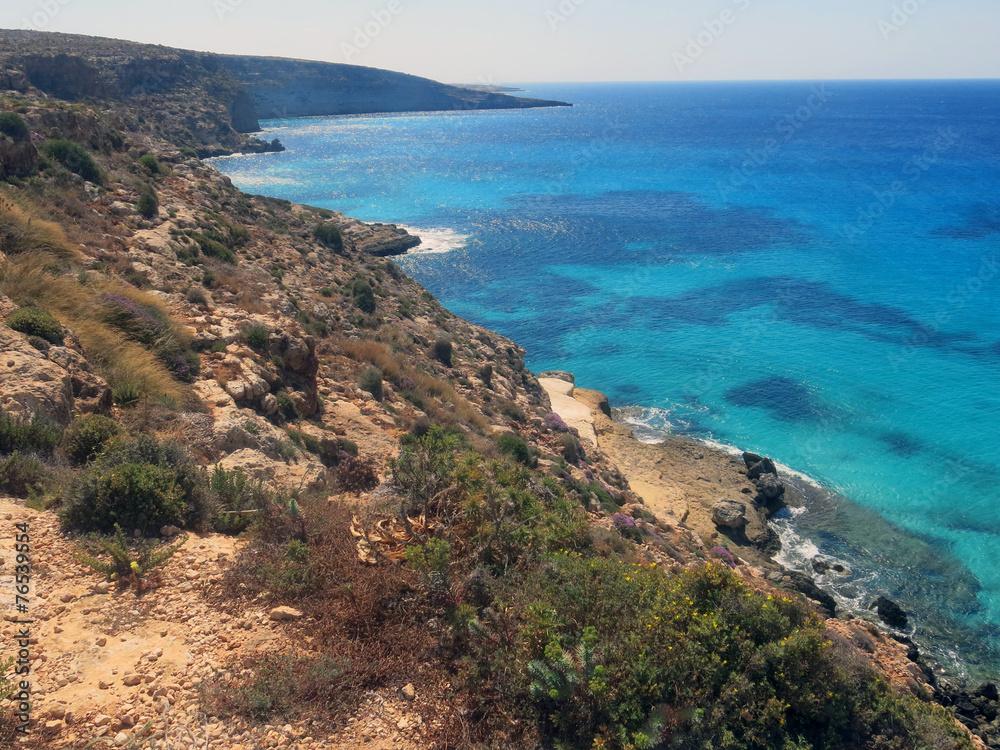 Lampedusa in Italy with Cliff and clean blue sea