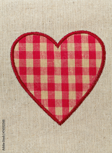 red heart on linen background