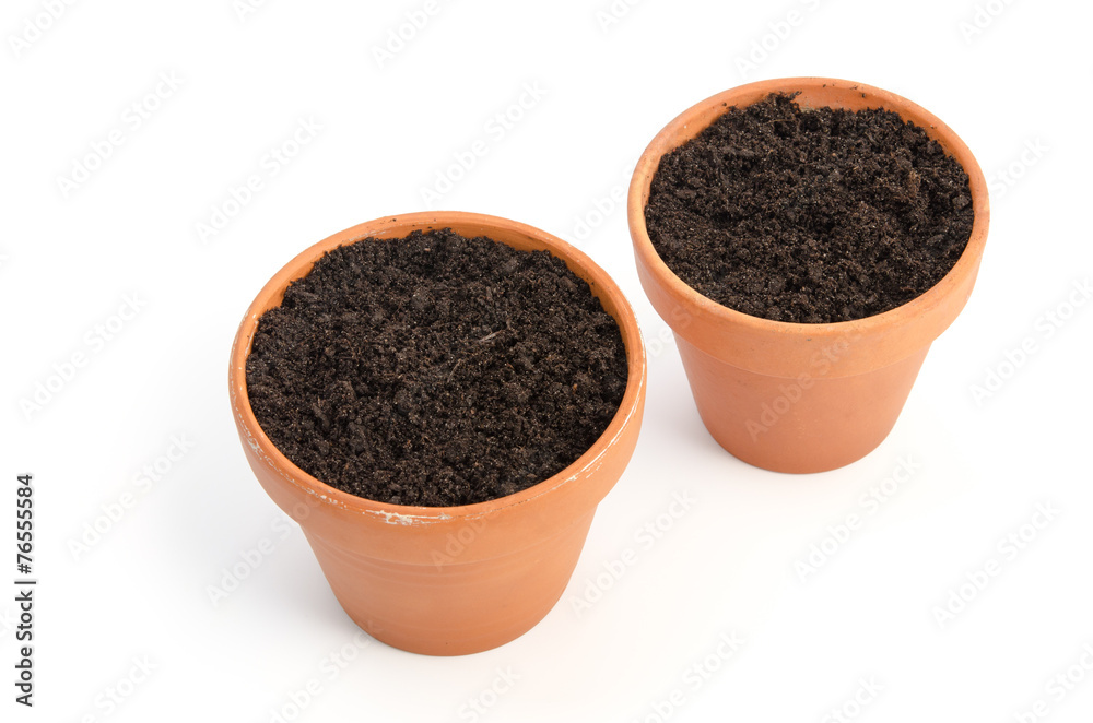 Blumentöpfe mit Blumenerde Blumentöpfe mit Blumenerde