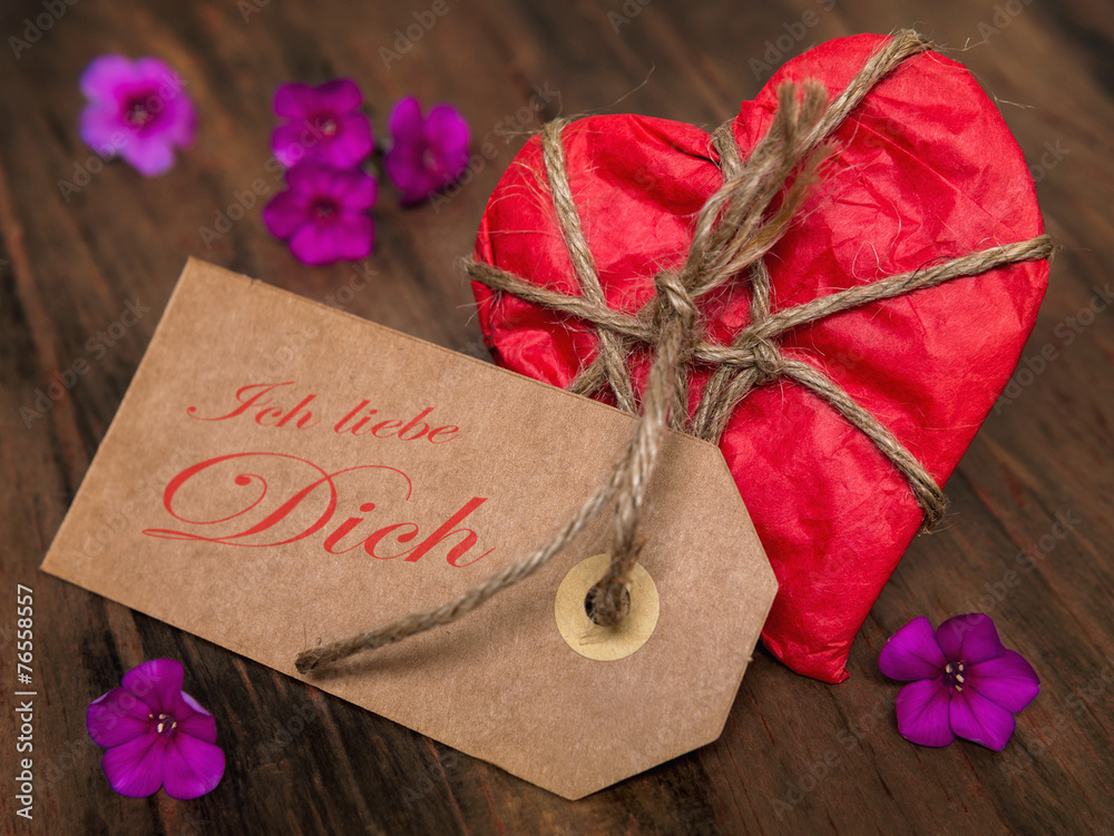 Herz verschenken StockFoto Adobe Stock