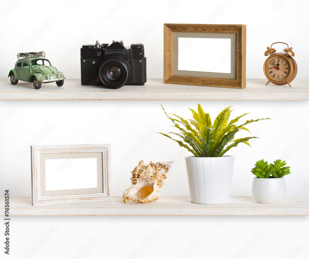 Wooden shelves with travel memory related objects Wooden shelves with travel memory related objects
