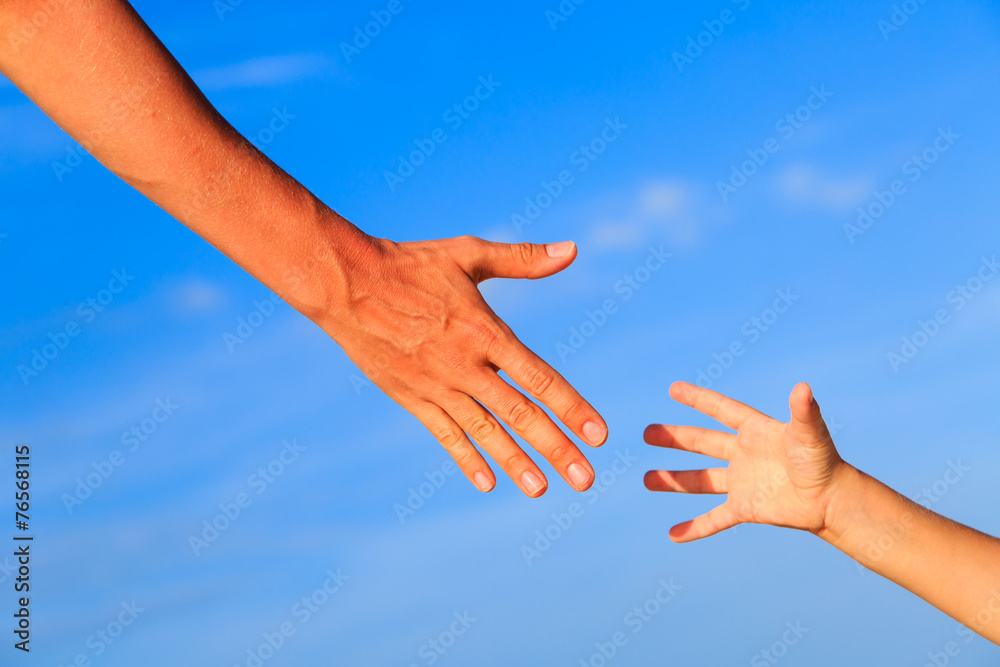 helping hand of mother and child on sky helping hand of mother and child on sky