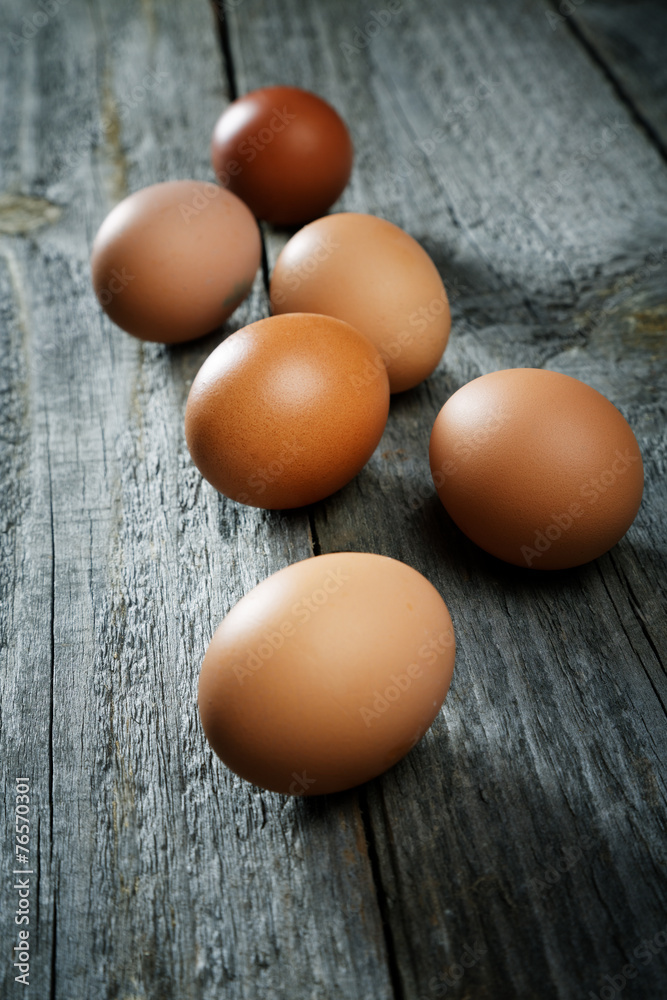 Eggs on an old rural table Eggs on an old rural table