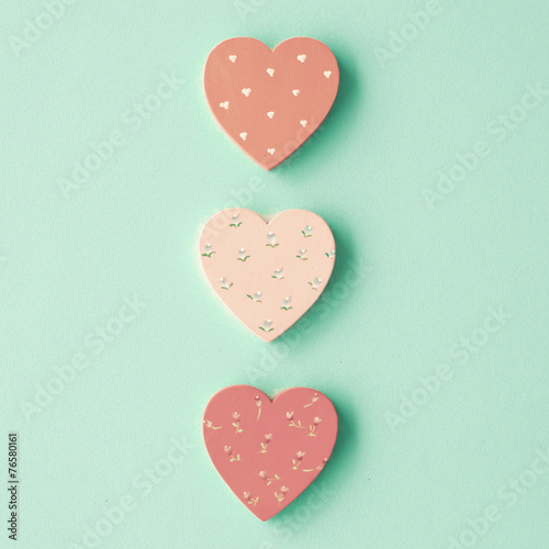 Three vintage hand-painted hearts